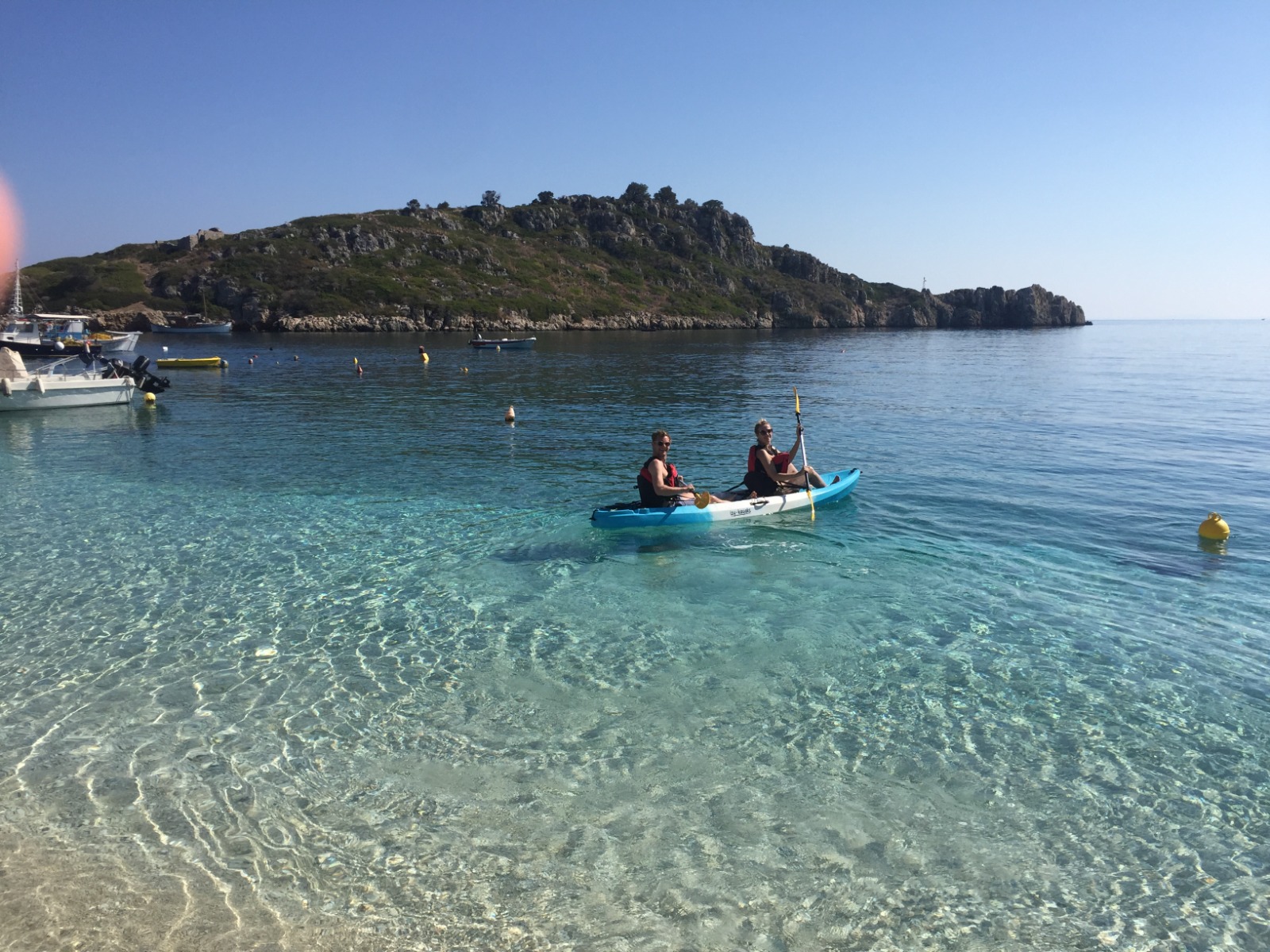 Kayaking in clear water at Agios Nikolaos